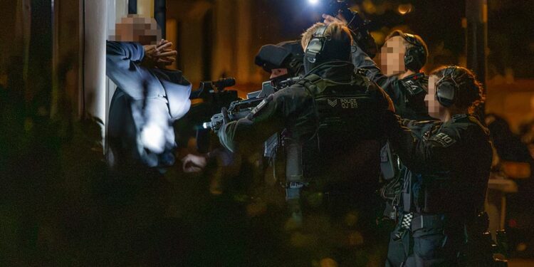 Three arrested following armed police stand-off at Swindon house