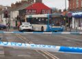 Police cordon off Swindon route after crash involving bus and car