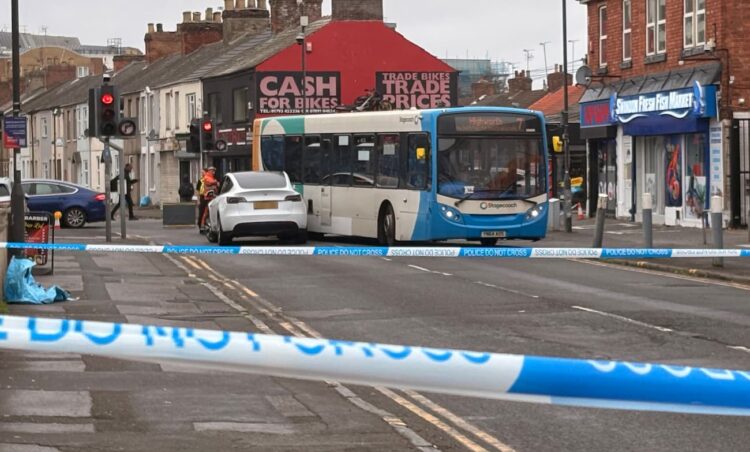 Police cordon off Swindon route after crash involving bus and car