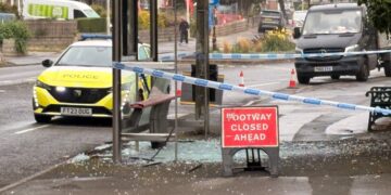Police guard Swindon bus stop after glass strewn across pavement
