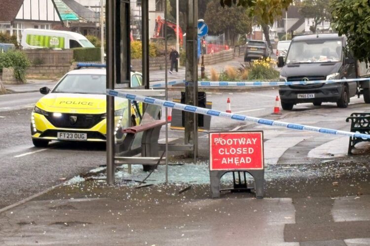 Police guard Swindon bus stop after glass strewn across pavement