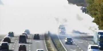 Smoke plume blinds drivers on M4 in Wiltshire after car catches fire