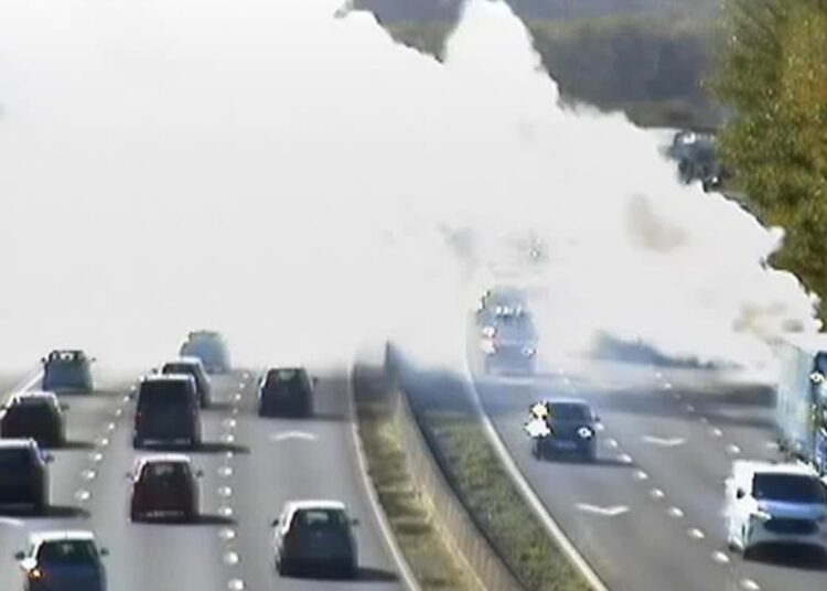 Smoke plume blinds drivers on M4 in Wiltshire after car catches fire